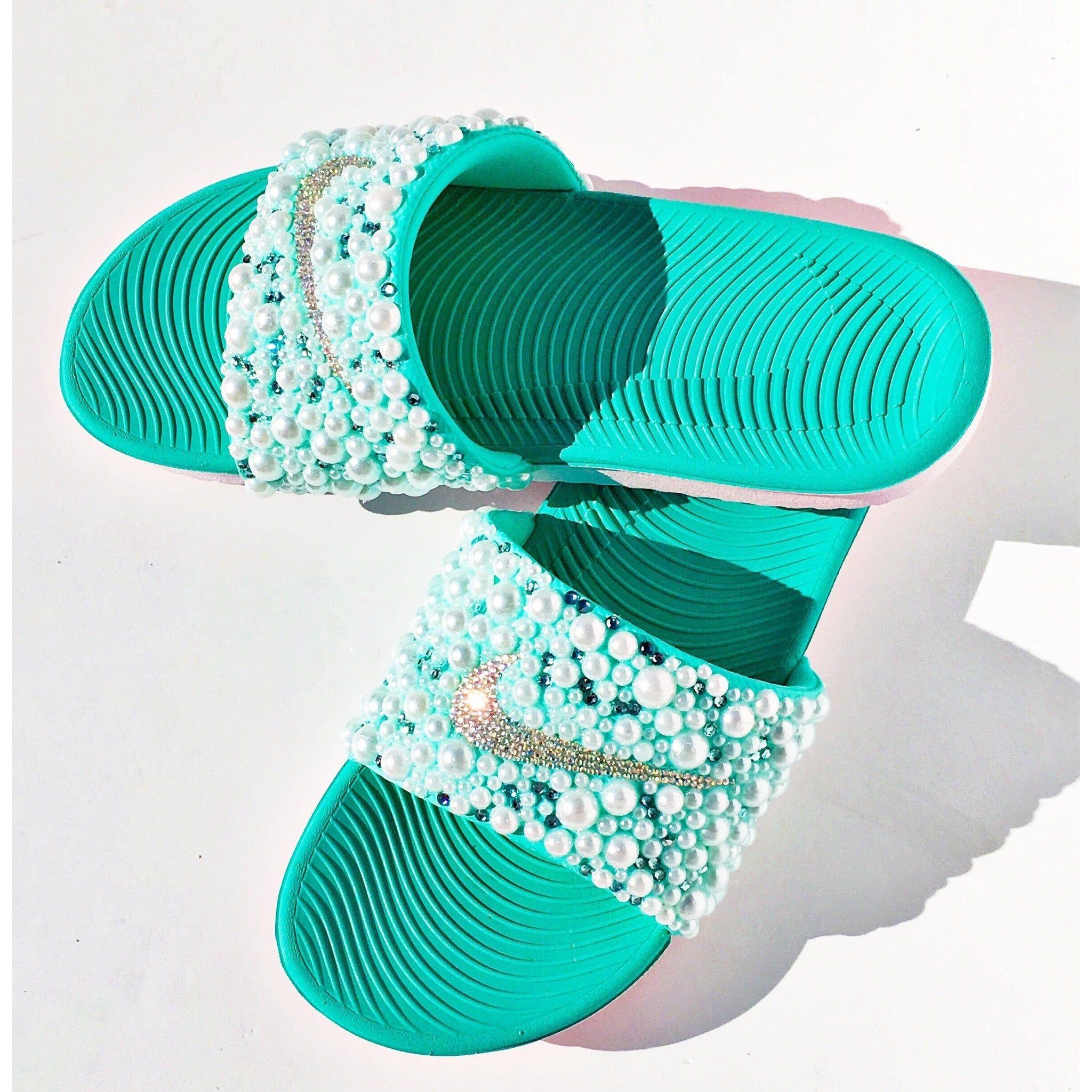 Teal top nike slides